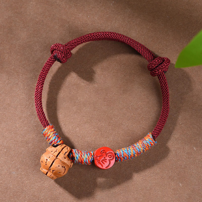 Handmade Chinese Zodiac Red String Peach Pit Cinnabar Luck Bracelet