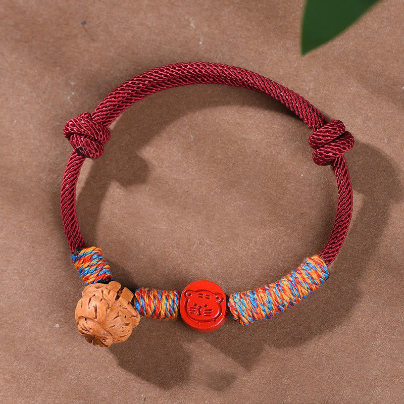 Handmade Chinese Zodiac Red String Peach Pit Cinnabar Luck Bracelet