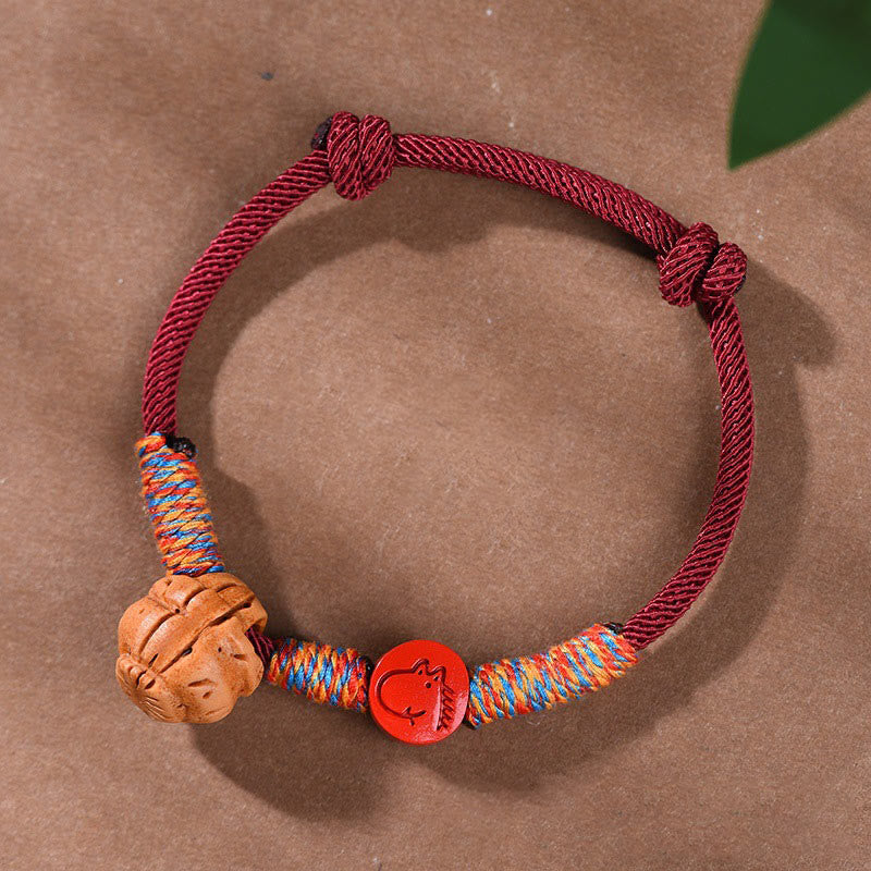 Handmade Chinese Zodiac Red String Peach Pit Cinnabar Luck Bracelet