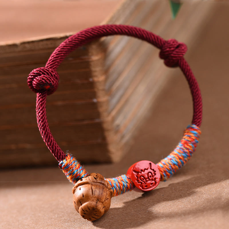 Handmade Chinese Zodiac Red String Peach Pit Cinnabar Luck Bracelet