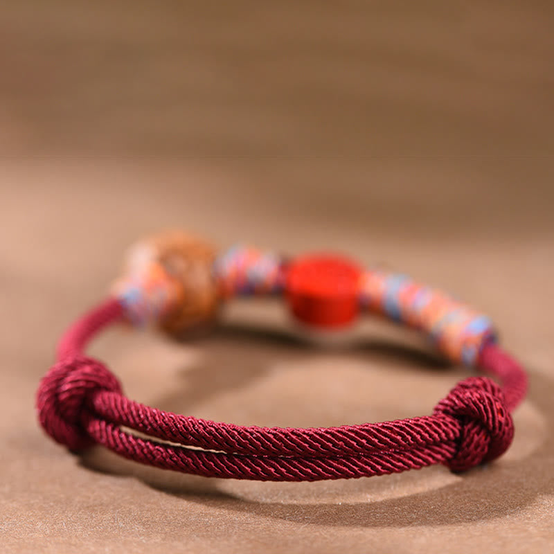 Handmade Chinese Zodiac Red String Peach Pit Cinnabar Luck Bracelet