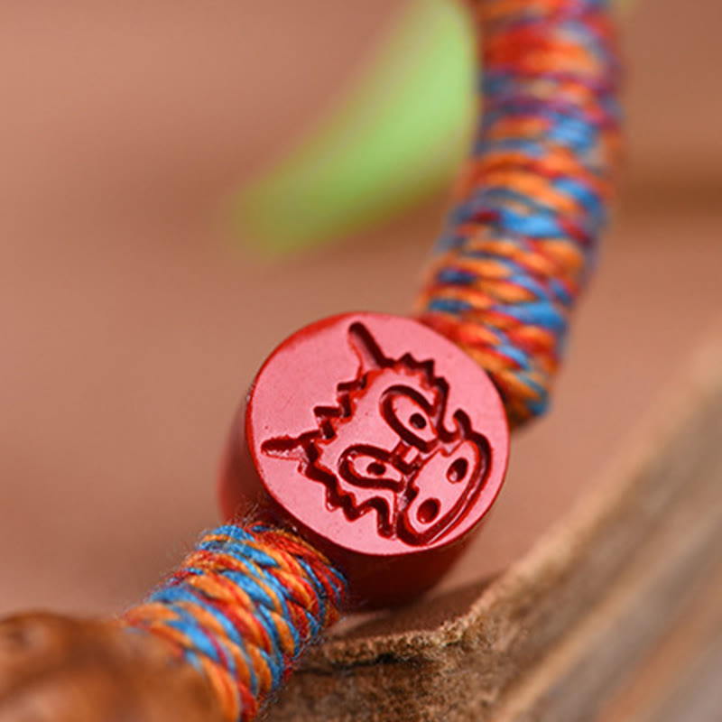 Handmade Chinese Zodiac Red String Peach Pit Cinnabar Luck Bracelet