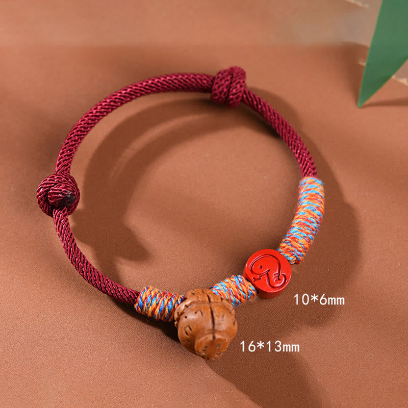 Handmade Chinese Zodiac Red String Peach Pit Cinnabar Luck Bracelet