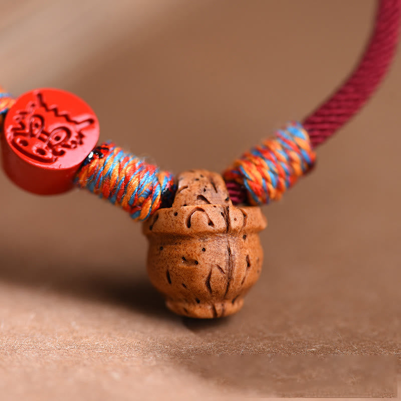 Handmade Chinese Zodiac Red String Peach Pit Cinnabar Luck Bracelet