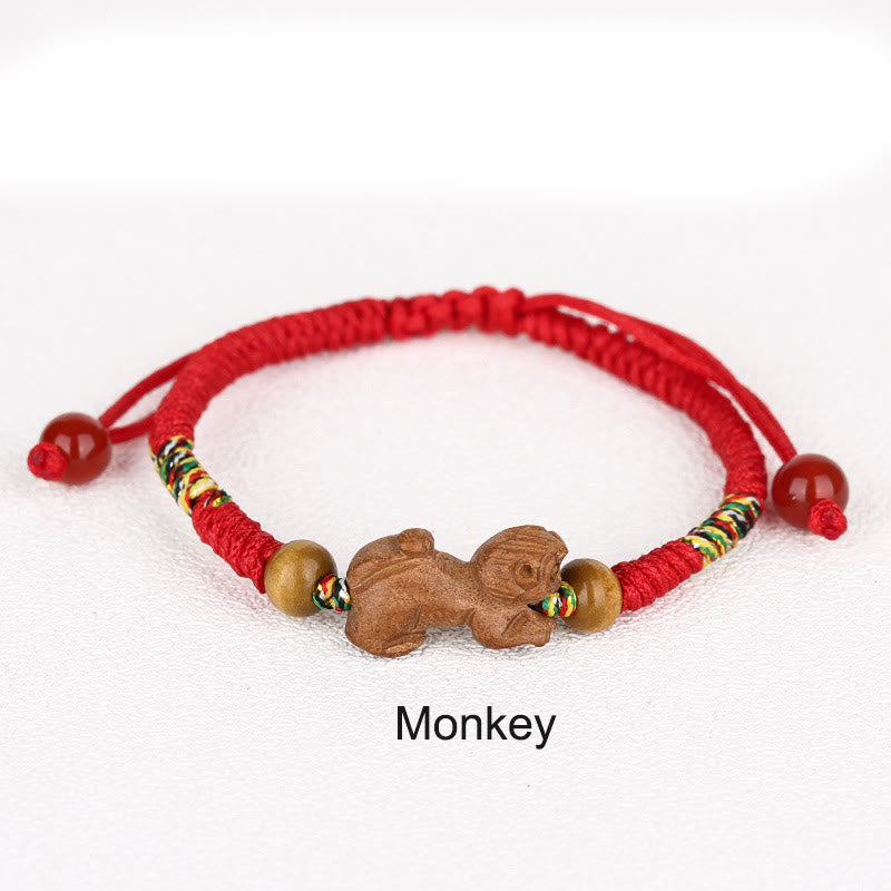 Handmade Chinese Zodiac Red String Peach Wood Luck Bracelet