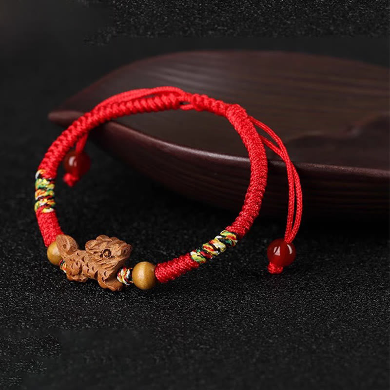 Handmade Chinese Zodiac Red String Peach Wood Luck Bracelet