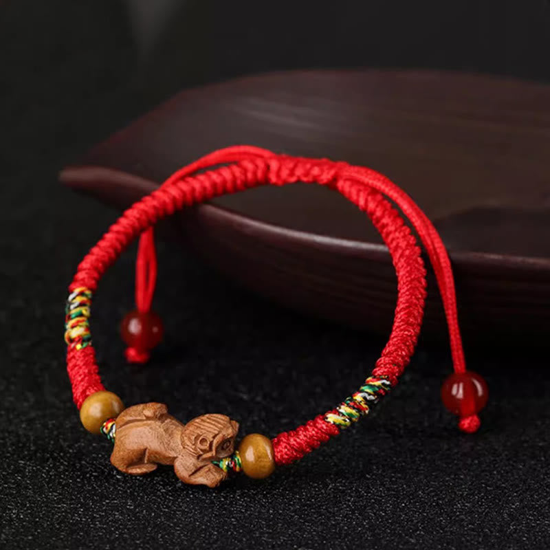 Handmade Chinese Zodiac Red String Peach Wood Luck Bracelet